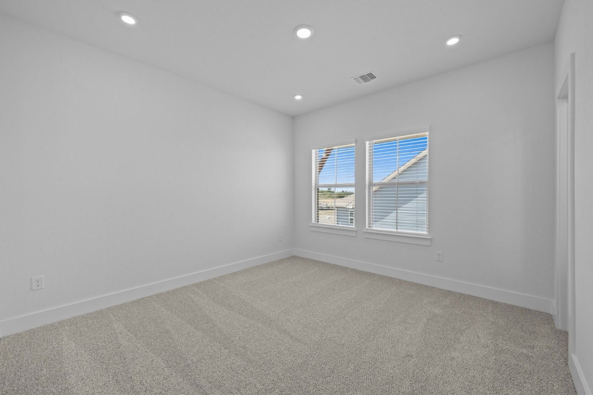 6312 Stockman Drive, Unit 5 Austin, TX 78747 - Photo 34 of 40 an empty room with a window
