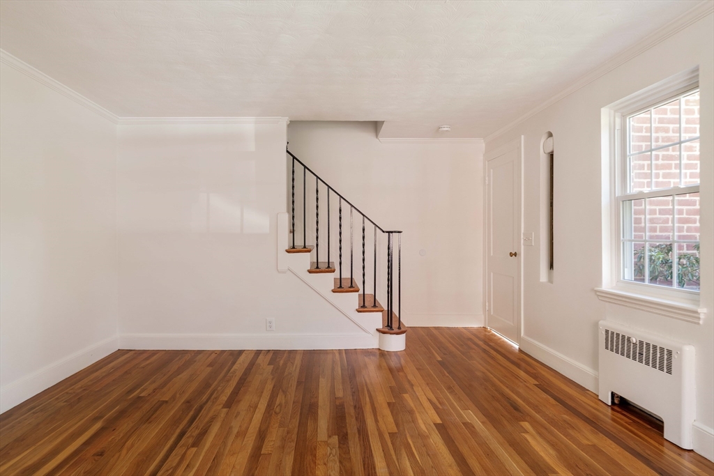 27 Payne Road, Unit 1 Newton, MA 02461 - Photo 12 of 18 a view of entryway with wooden floor