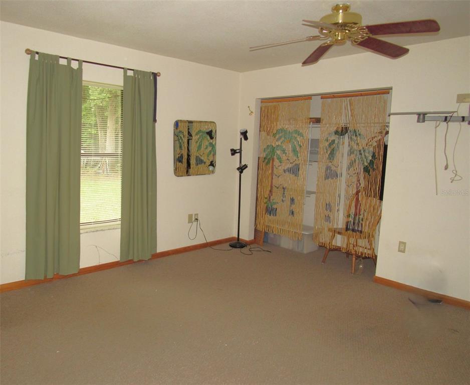 Undisclosed Address Reddick, FL 32686 - Photo 27 of 43 a view of an empty room with a window