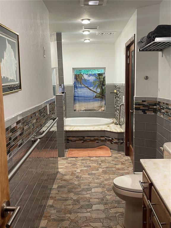 Undisclosed Address Reddick, FL 32686 - Photo 28 of 43 a bathroom with a sink a toilet and shower