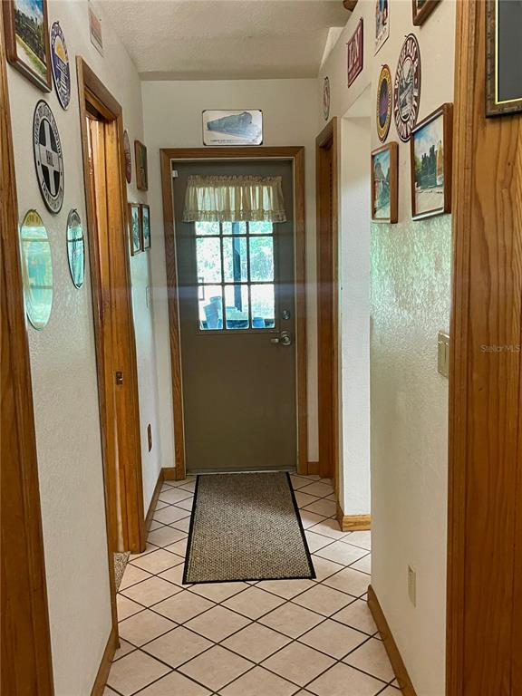 Undisclosed Address Reddick, FL 32686 - Photo 4 of 43 a view of entryway door