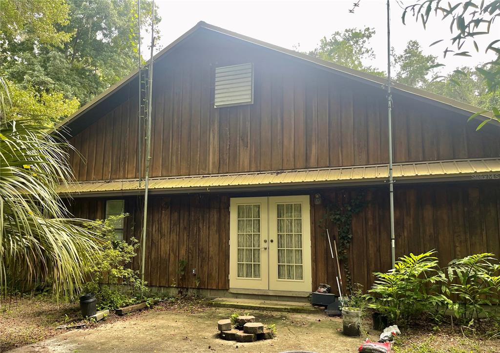 Undisclosed Address Reddick, FL 32686 - Photo 9 of 43 a front view of a house