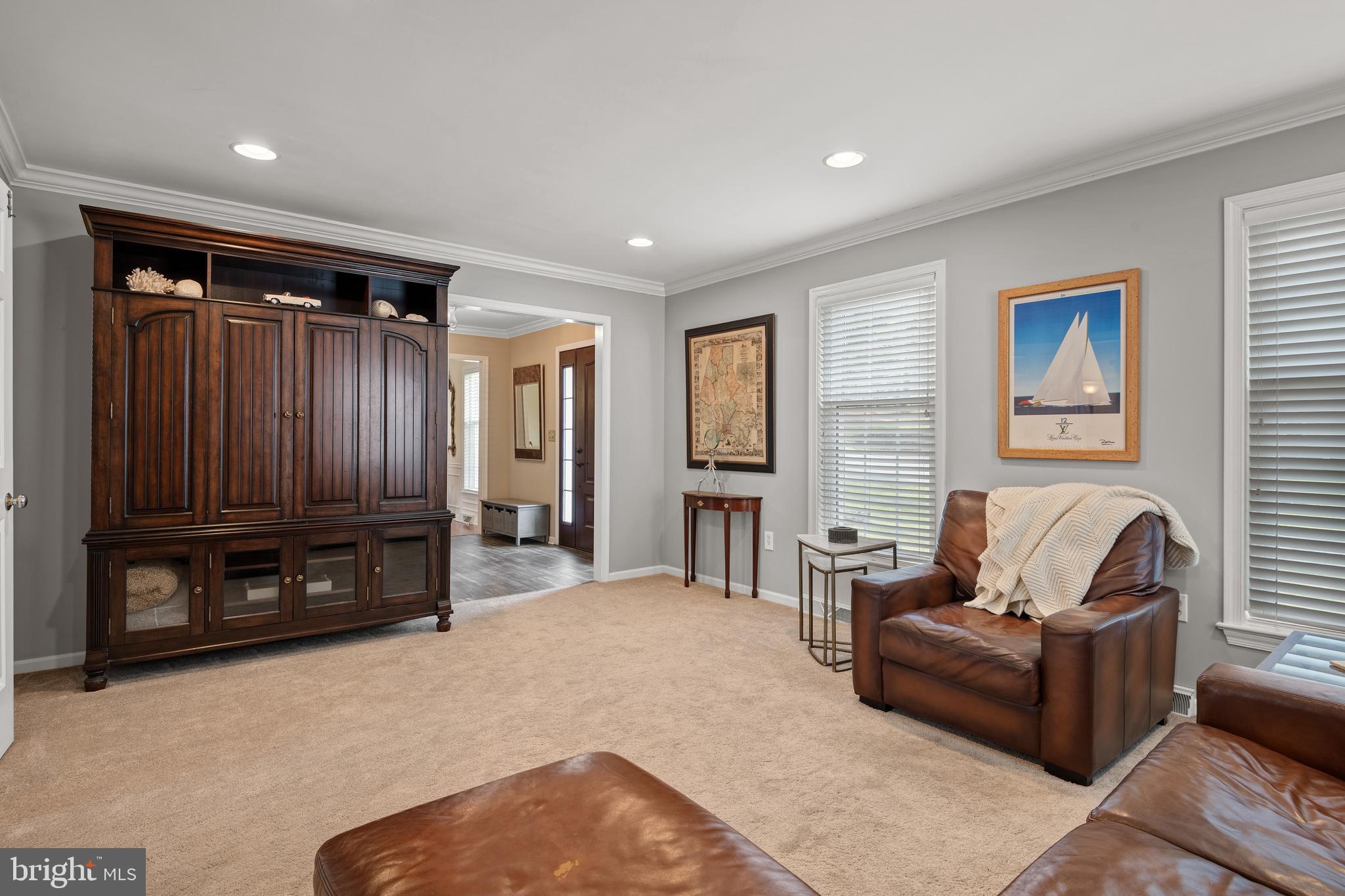 2705 Spring Valley Road Lancaster, PA 17601 - Photo 15 of 60 a living room with furniture and a refrigerator