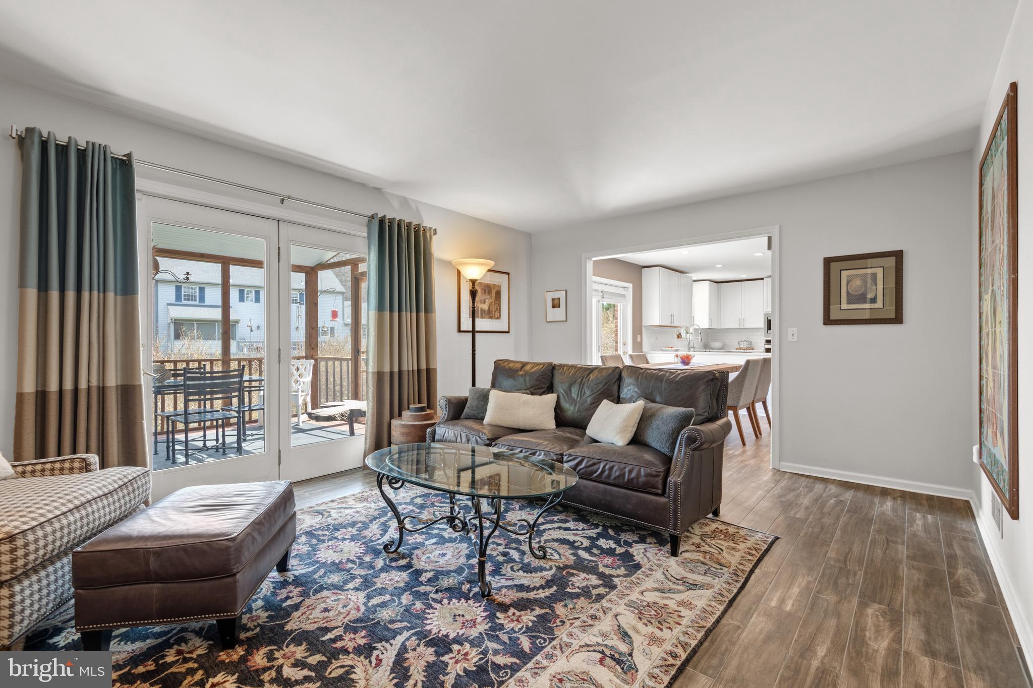 2705 Spring Valley Road Lancaster, PA 17601 - Photo 16 of 60 a living room with furniture and a floor to ceiling window