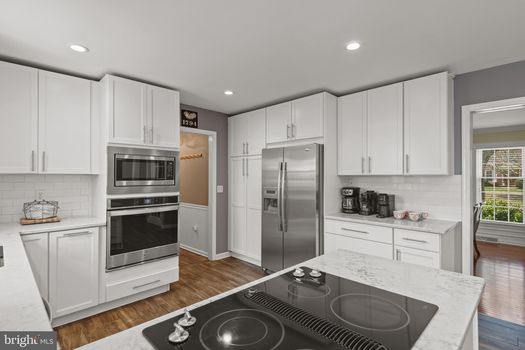 2705 Spring Valley Road Lancaster, PA 17601 - Photo 21 of 60 a kitchen with granite countertop a sink stove and refrigerator