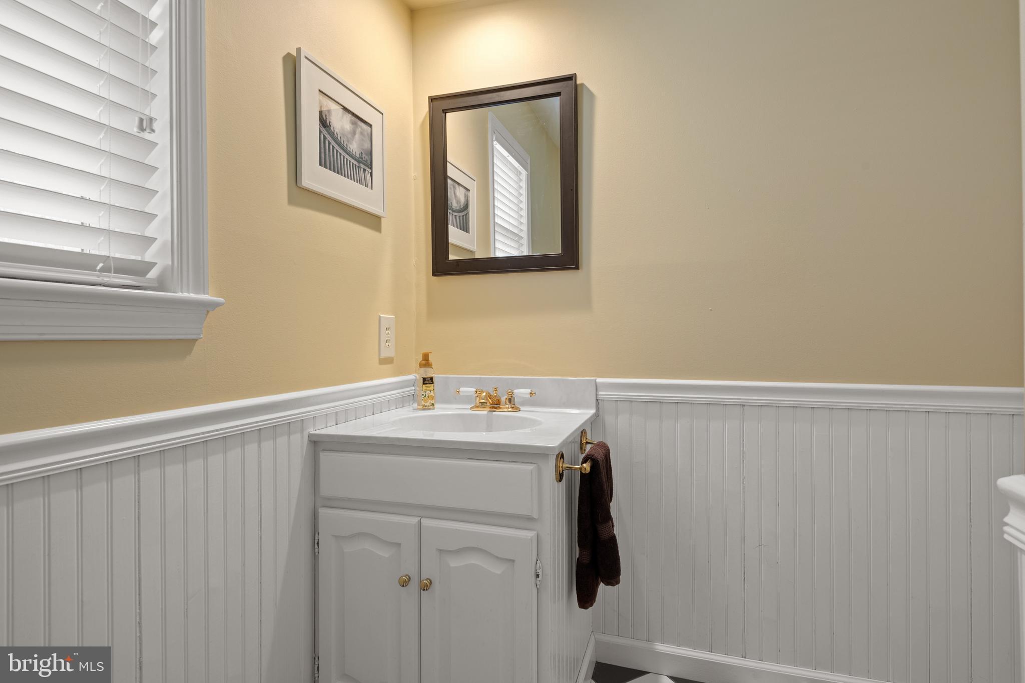2705 Spring Valley Road Lancaster, PA 17601 - Photo 26 of 60 a bathroom with a sink and a mirror