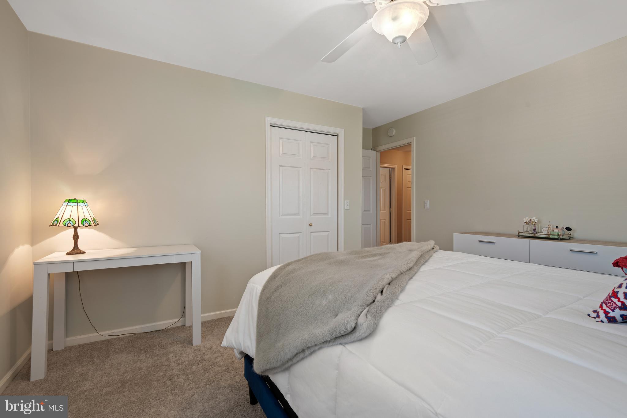 2705 Spring Valley Road Lancaster, PA 17601 - Photo 33 of 60 a bedroom with a bed and a chandelier