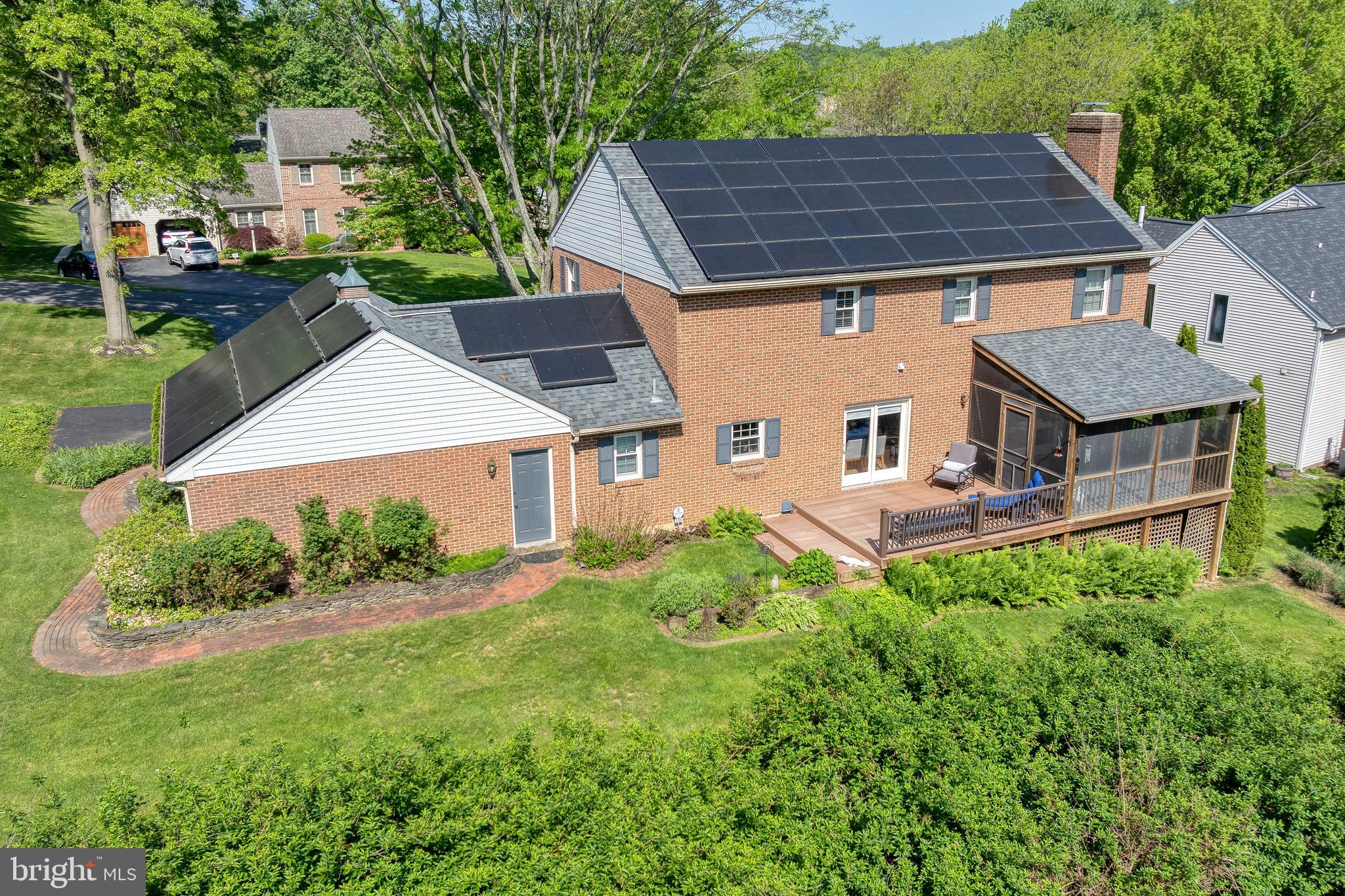 2705 Spring Valley Road Lancaster, PA 17601 - Photo 48 of 60 an aerial view of a house with yard and trees in the background