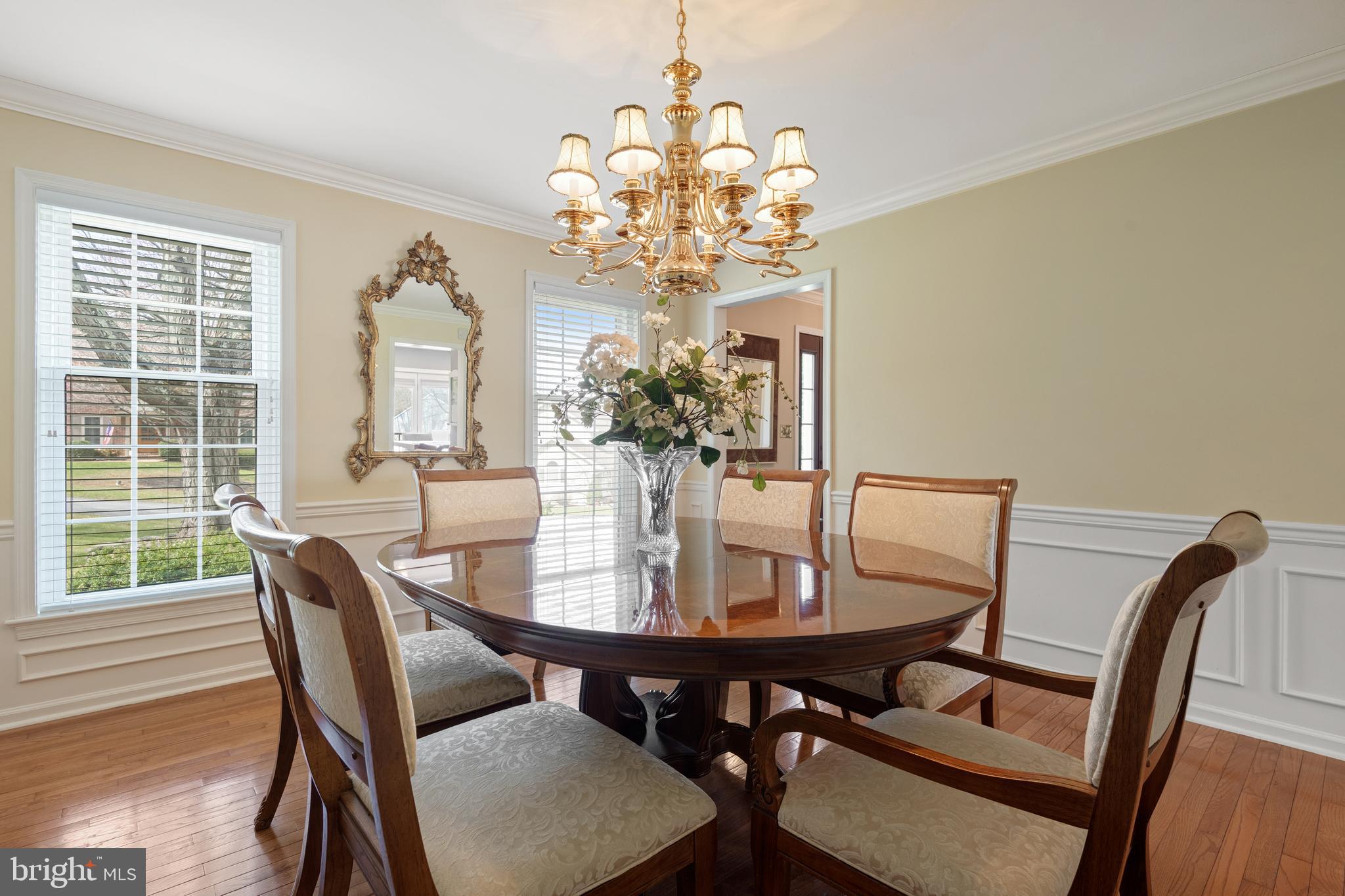 2705 Spring Valley Road Lancaster, PA 17601 - Photo 7 of 60 a view of a dining room with furniture a chandelier and wooden floor