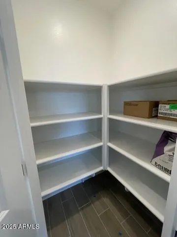 a view of room with walk in closet