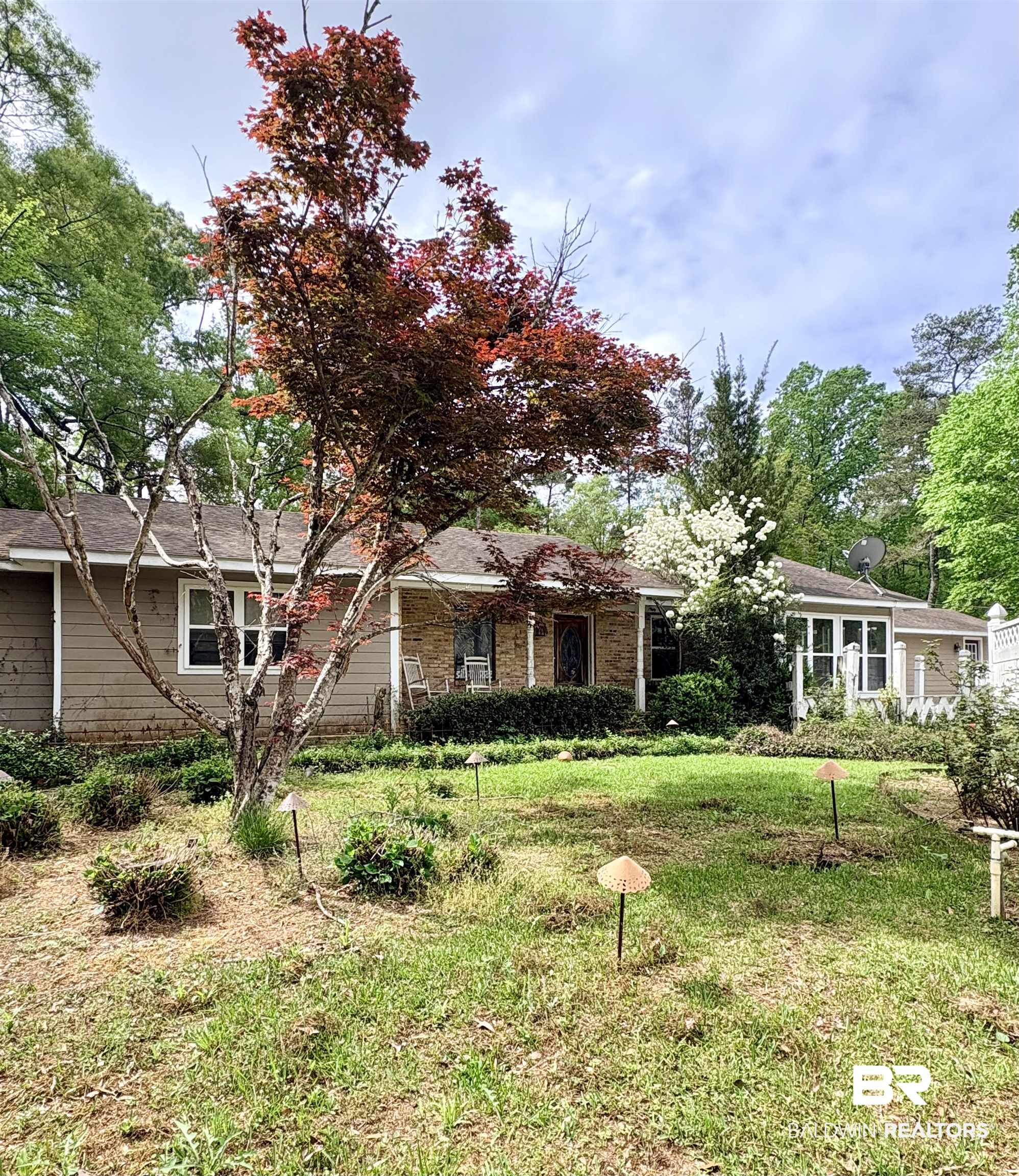 1018 Bates Road Evergreen, AL 36401 - Photo 17 of 21 View of front of property with a front lawn and brick siding