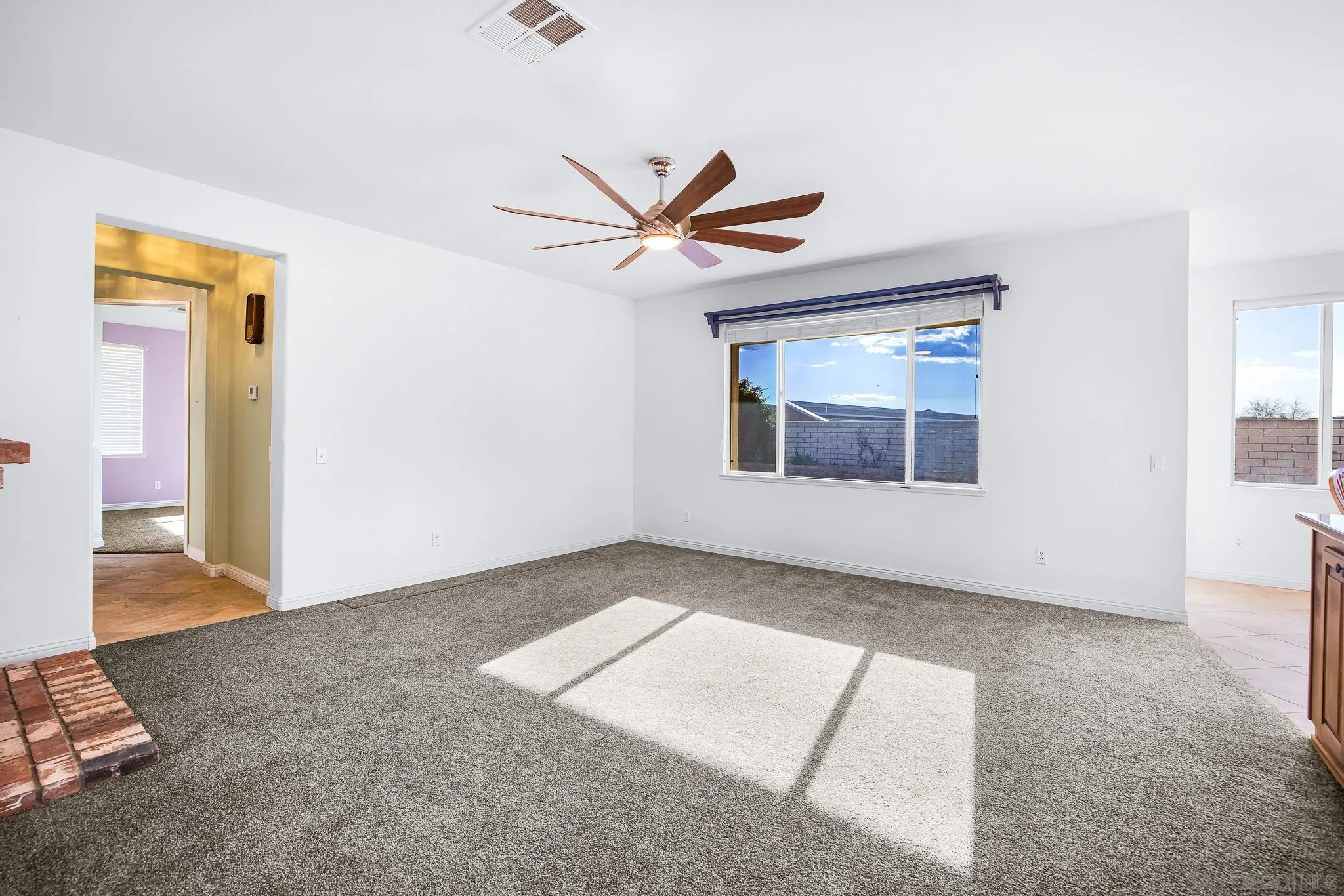 35511 Shadow Drive Winchester, CA 92596 - Photo 13 of 34 wooden floor in an empty room with a window