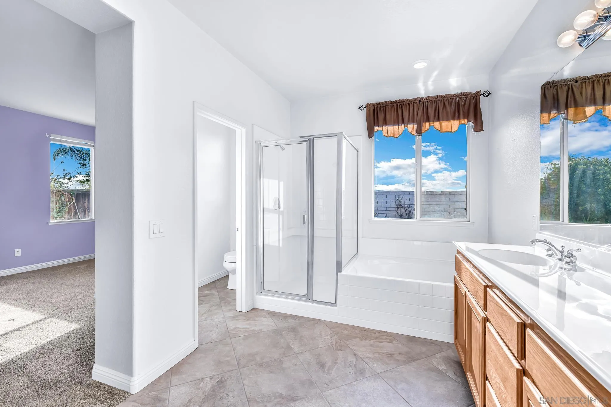 35511 Shadow Drive Winchester, CA 92596 - Photo 22 of 34 a spacious bathroom with a tub and a large window