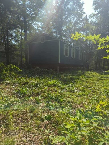 1346 Elliot Road Nunnelly, TN 37137 - Photo 8 of 12 a view of a backyard