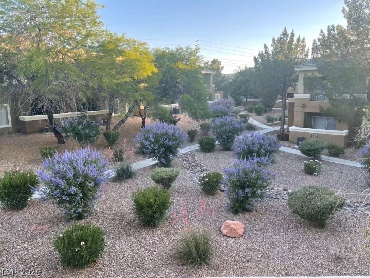 8070 West Russell Road, Unit 2070 Las Vegas, NV 89113 - Photo 14 of 25 Summer back view from balcony