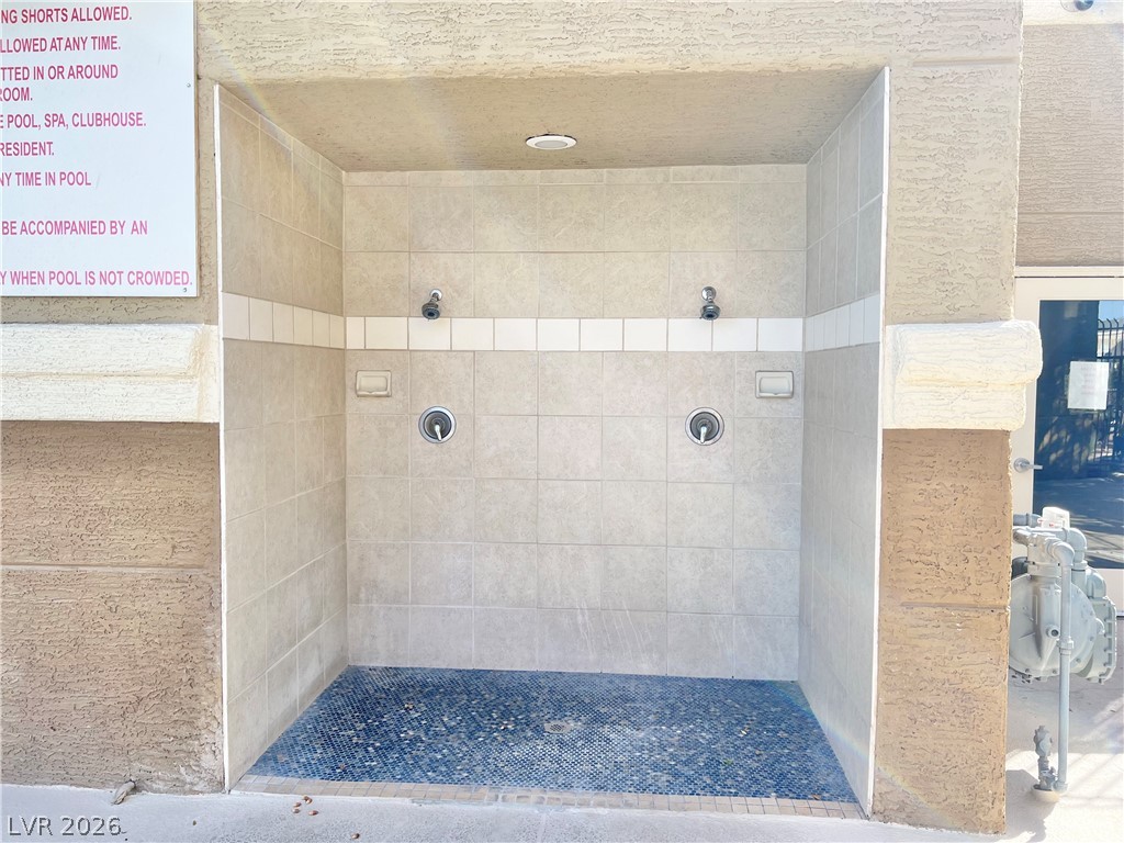 8070 West Russell Road, Unit 2070 Las Vegas, NV 89113 - Photo 22 of 25 Pool area outside shower