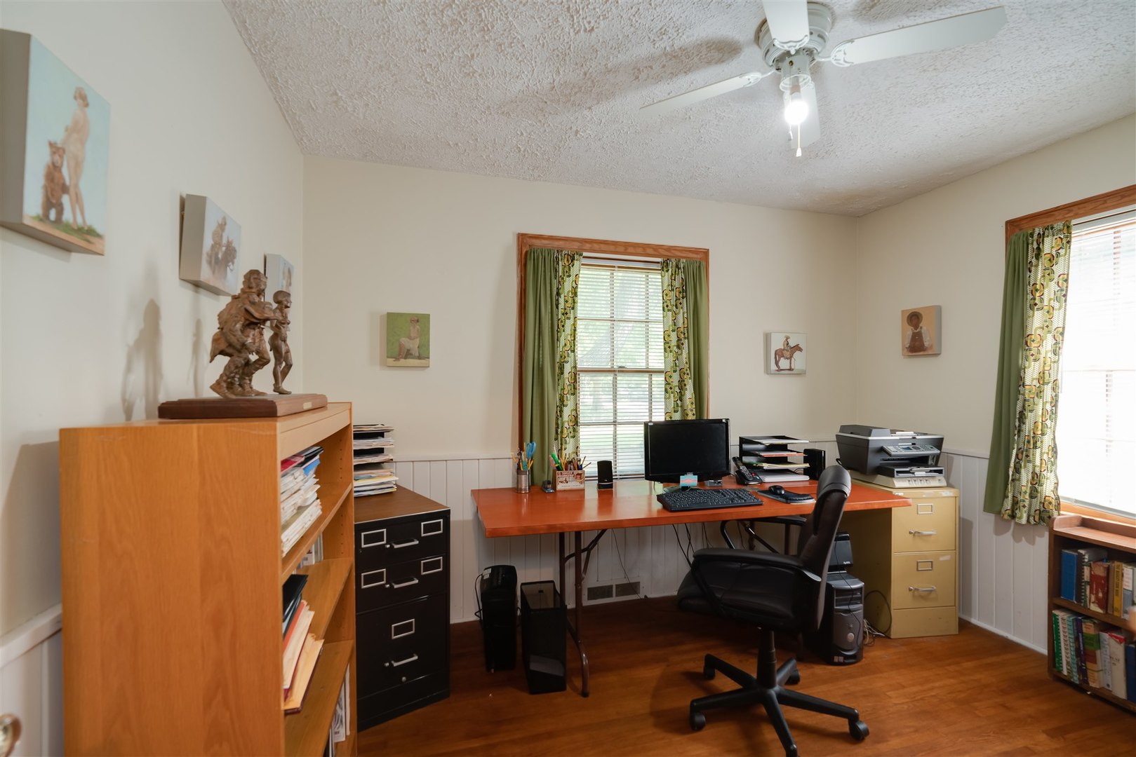 32 White Place Bloomington, IL 61701 - Photo 11 of 26 a view of a workspace with furniture and a window