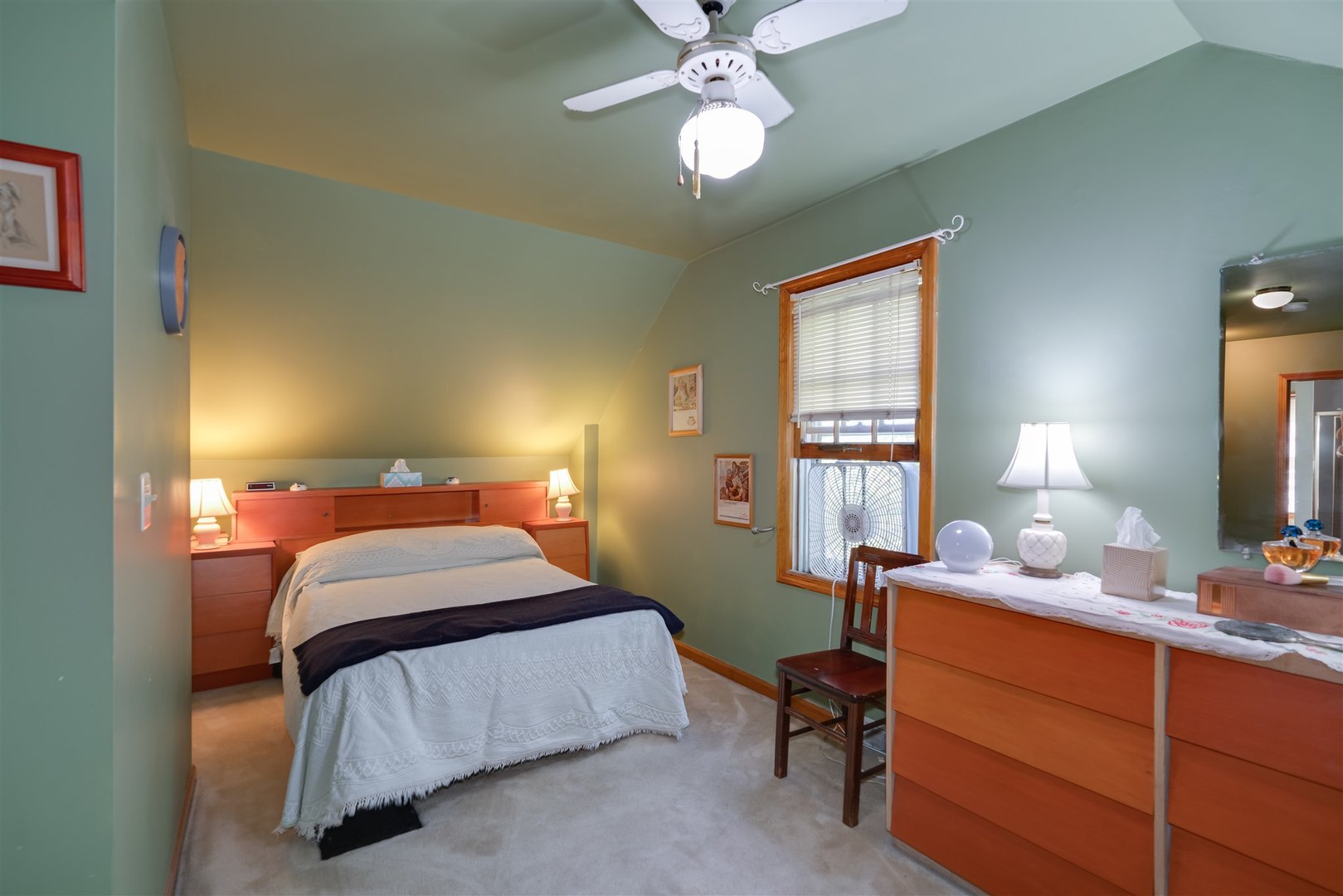 32 White Place Bloomington, IL 61701 - Photo 16 of 26 a bedroom with a bed and a window