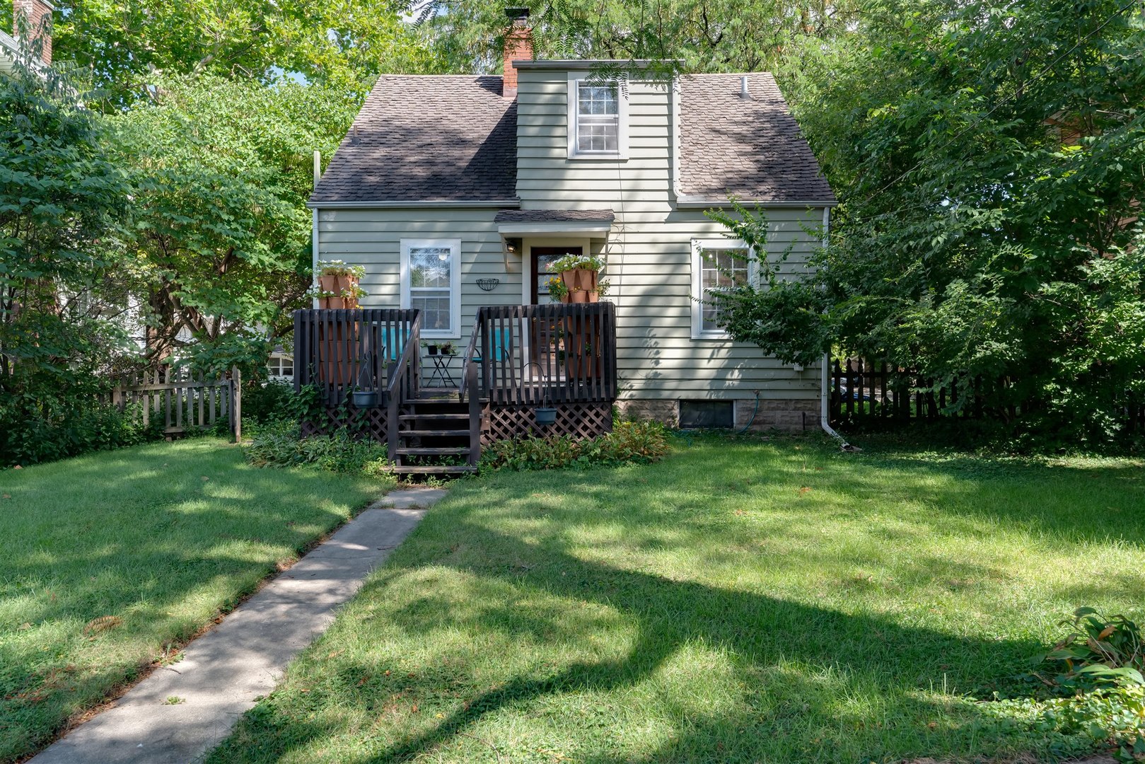 32 White Place Bloomington, IL 61701 - Photo 24 of 26 a front view of a house with garden