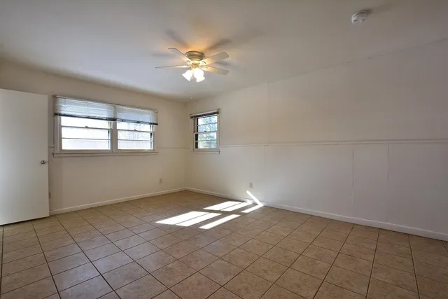a view of an empty room and window