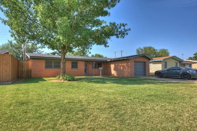a house view with a garden space