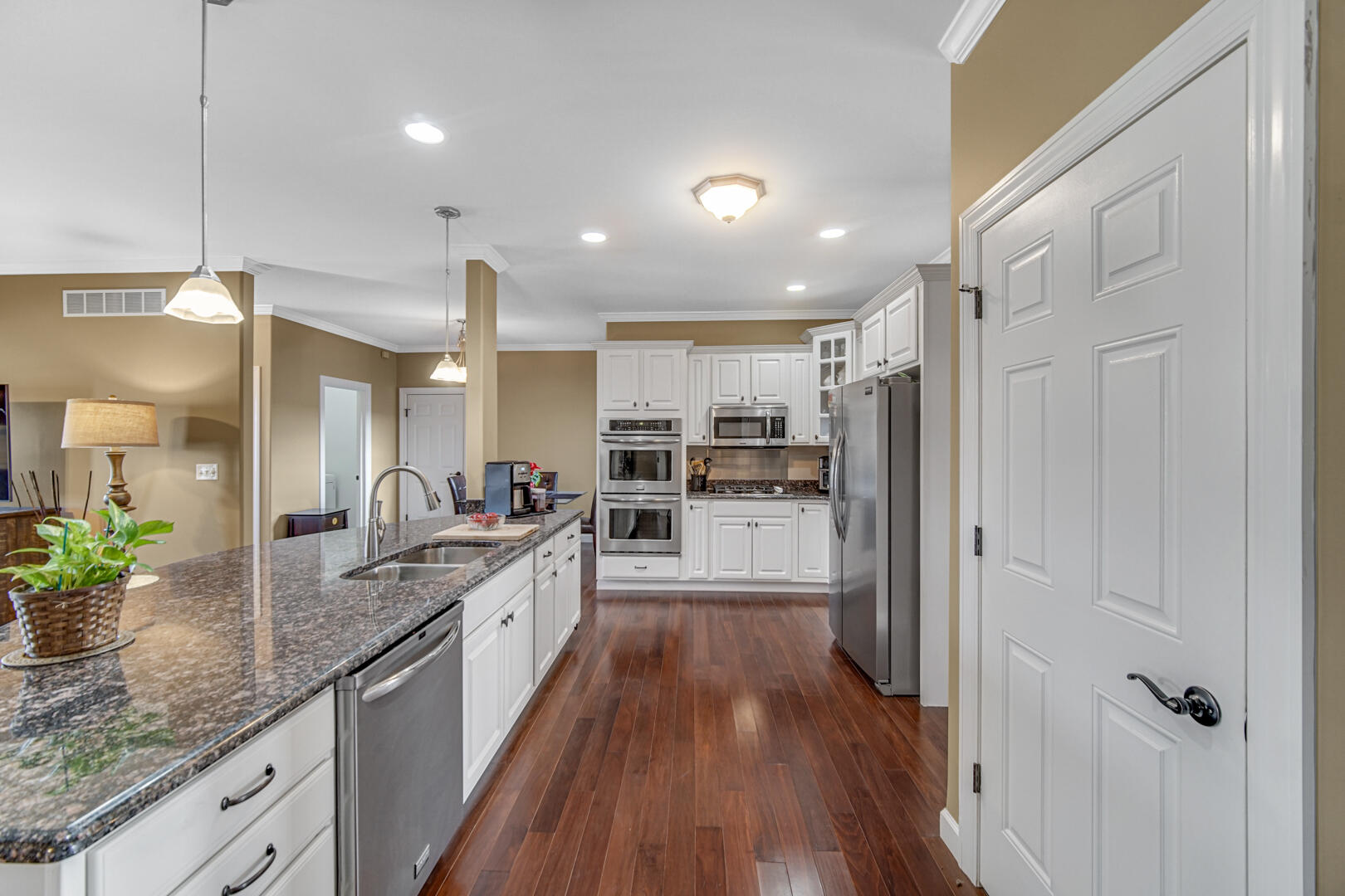 491 West Division Road Valparaiso, IN 46385 - Photo 12 of 38 a large kitchen with kitchen island white cabinets and stainless steel appliances