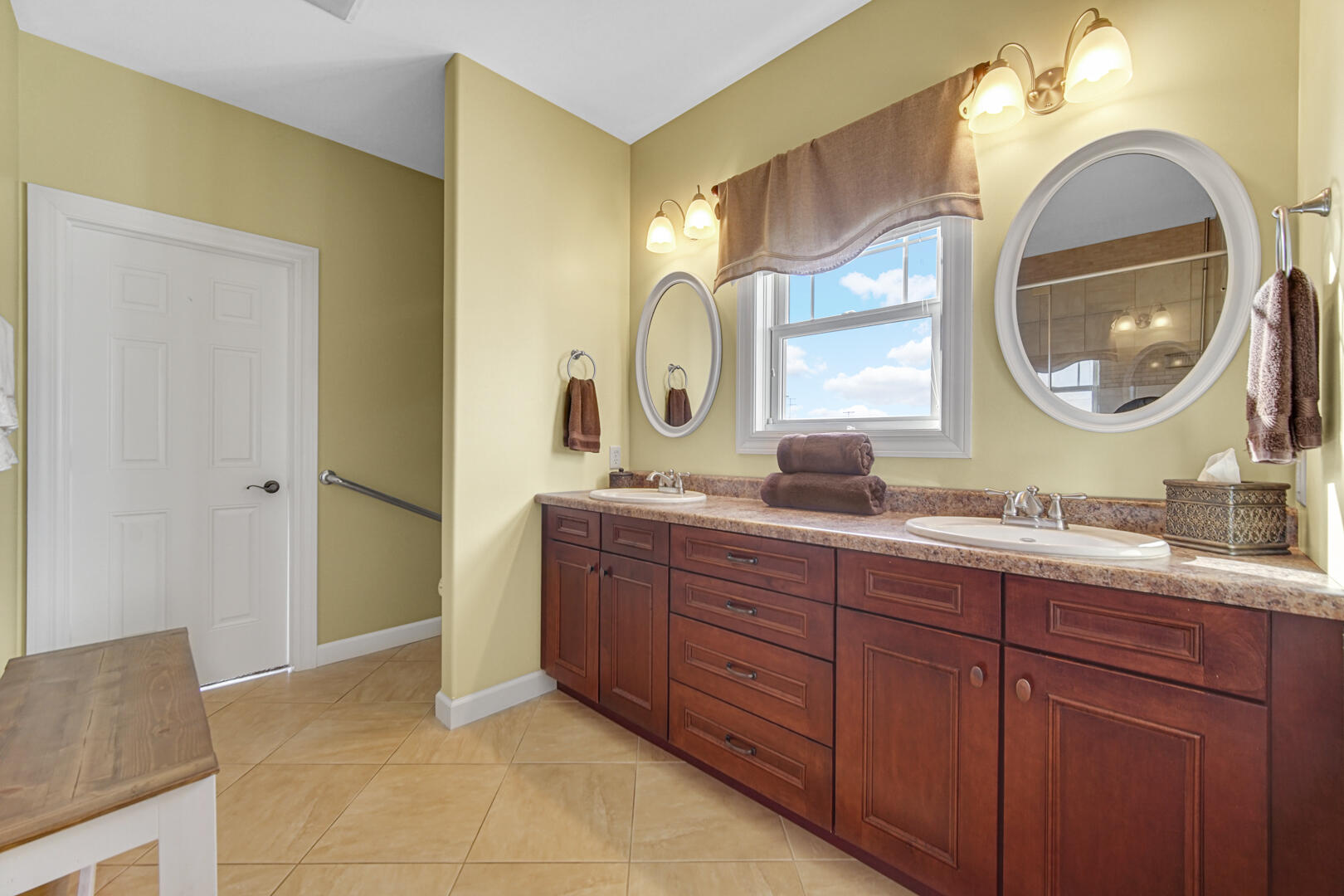 491 West Division Road Valparaiso, IN 46385 - Photo 22 of 38 a bathroom with a granite countertop double vanity sink and a mirror