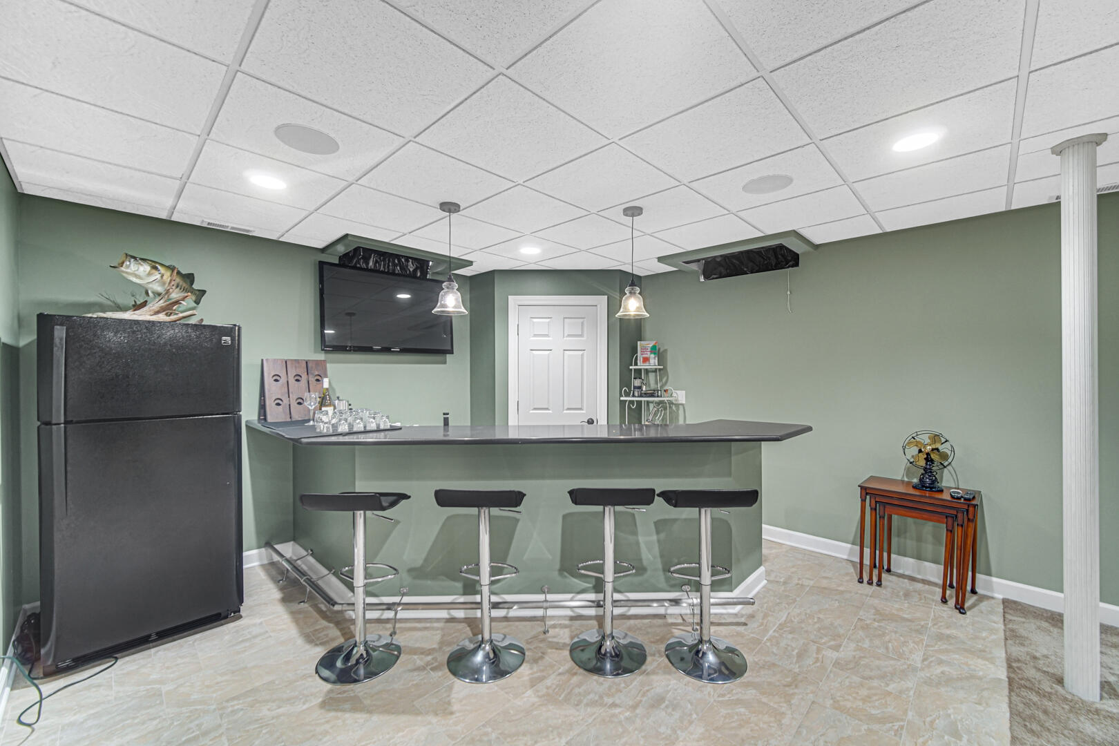 491 West Division Road Valparaiso, IN 46385 - Photo 31 of 38 a kitchen with a sink and a refrigerator
