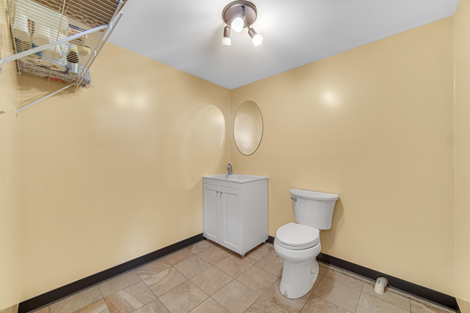 491 West Division Road Valparaiso, IN 46385 - Photo 36 of 38 a bathroom with a toilet and a mirror