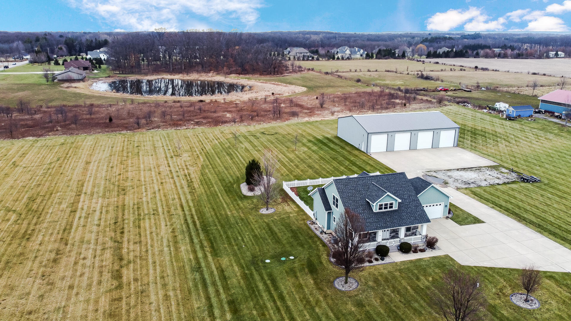 491 West Division Road Valparaiso, IN 46385 - Photo 6 of 38 an aerial view of residential houses with outdoor space and swimming pool