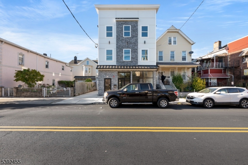 56 Second Street Elizabeth Port, NJ 07206 - Photo 1 of 28 a car parked in front of a building