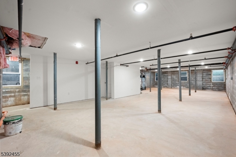 56 Second Street Elizabeth Port, NJ 07206 - Photo 23 of 28 a view of empty room with wooden floor