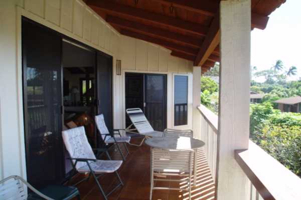 1870 Hoone Road, Unit 525 Koloa, HI 96756 - Photo 2 of 19 a view of balcony with chairs and a potted plant