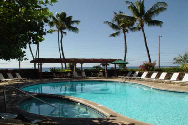 1870 Hoone Road, Unit 525 Koloa, HI 96756 - Photo 3 of 19 a view of a swimming pool with a deck