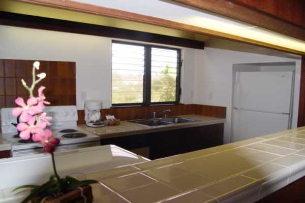 1870 Hoone Road, Unit 525 Koloa, HI 96756 - Photo 6 of 19 a view of a living room and bathroom