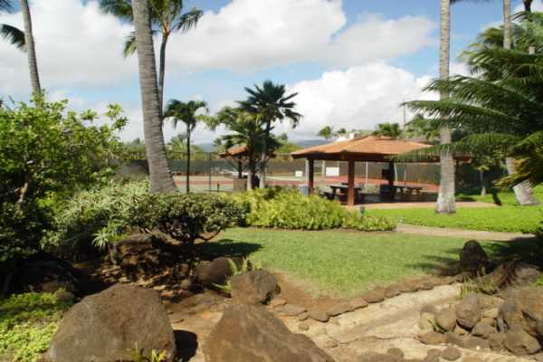 1870 Hoone Road, Unit 525 Koloa, HI 96756 - Photo 7 of 19 a front view of a house with garden