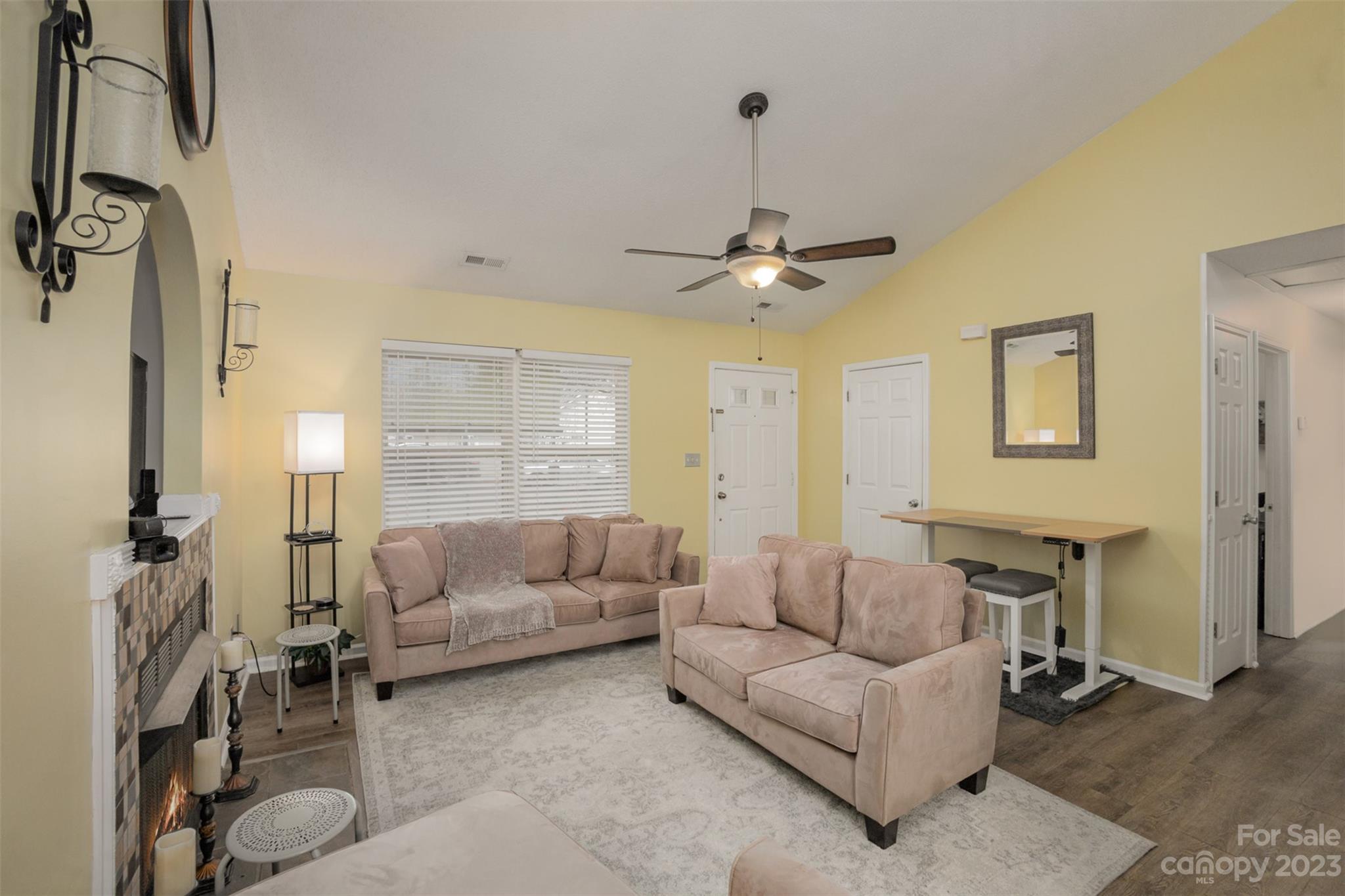 3144 Strong Gastonia, NC 28052 - Photo 12 of 26 a living room with furniture and a chandelier