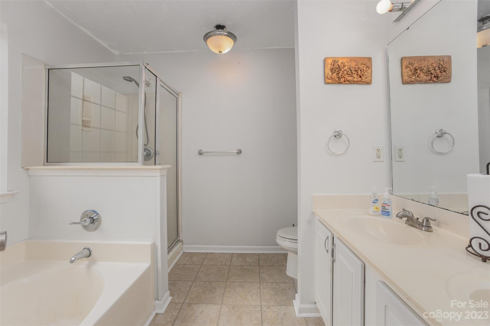 3144 Strong Gastonia, NC 28052 - Photo 22 of 26 a bathroom with a sink a toilet and shower