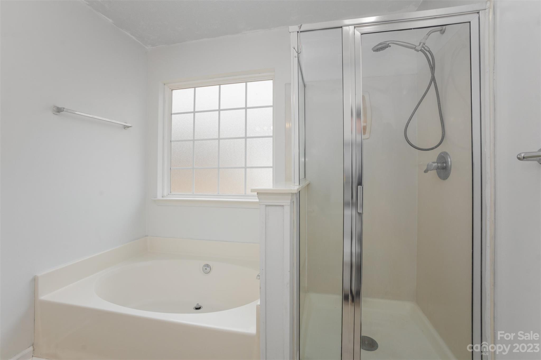 3144 Strong Gastonia, NC 28052 - Photo 23 of 26 a bathroom with a bath tub and a shower