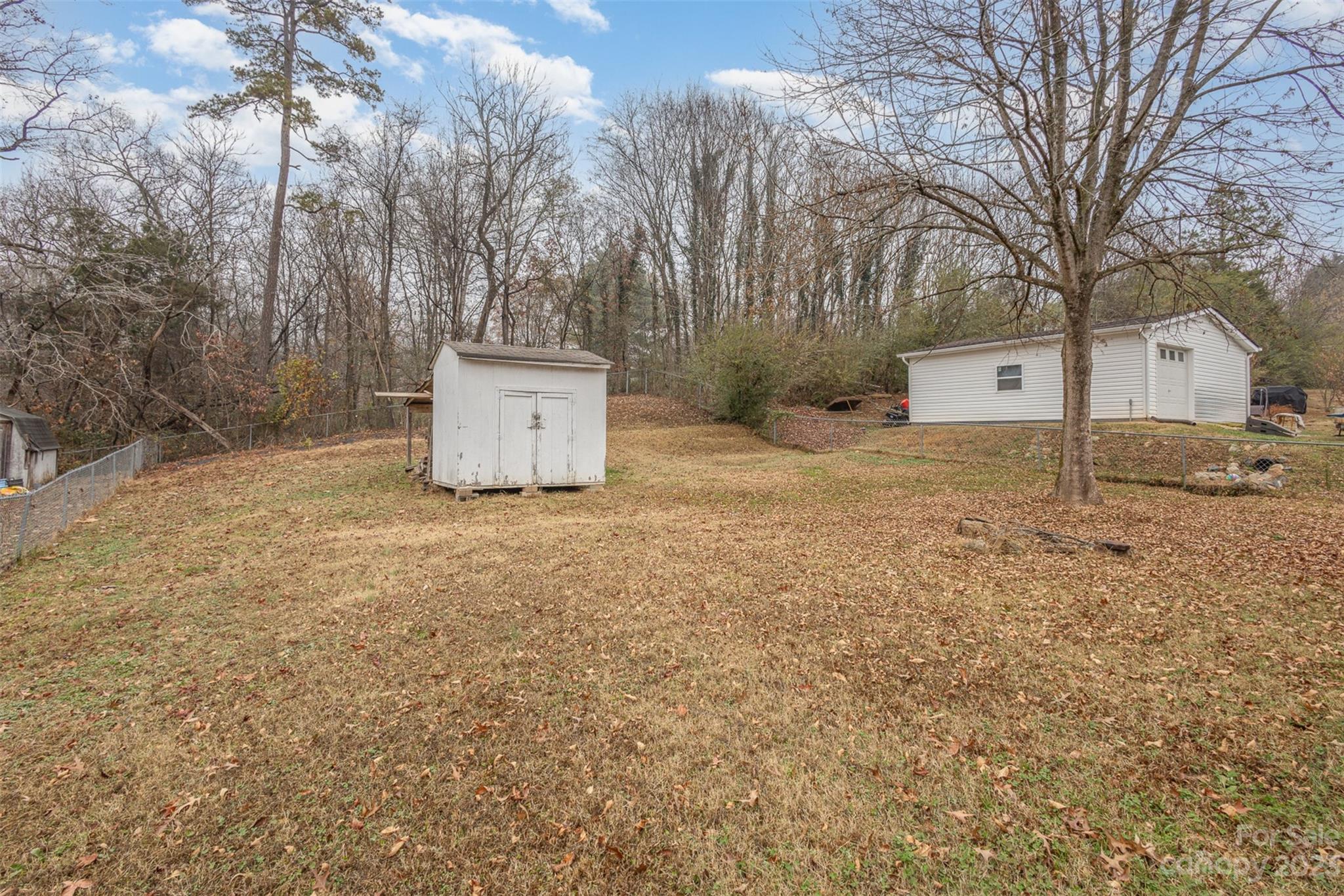 3144 Strong Gastonia, NC 28052 - Photo 6 of 26 a white house that has a tree in front of it