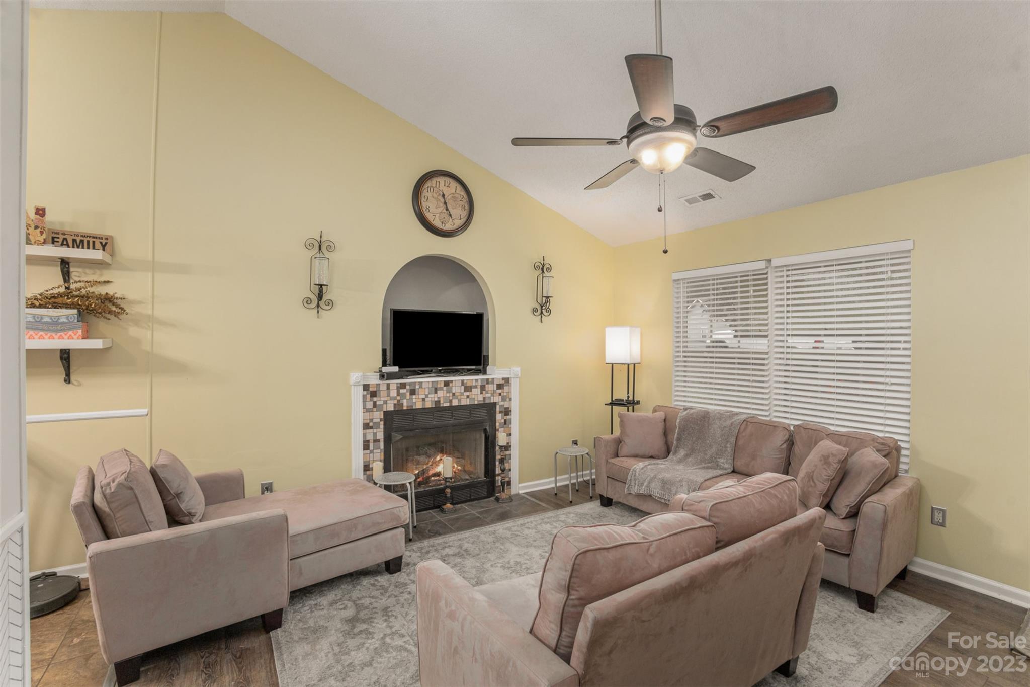 3144 Strong Gastonia, NC 28052 - Photo 10 of 26 a living room with furniture a fireplace and a window