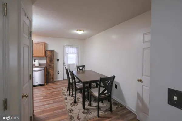 a kitchen with stainless steel appliances granite countertop a stove and a microwave