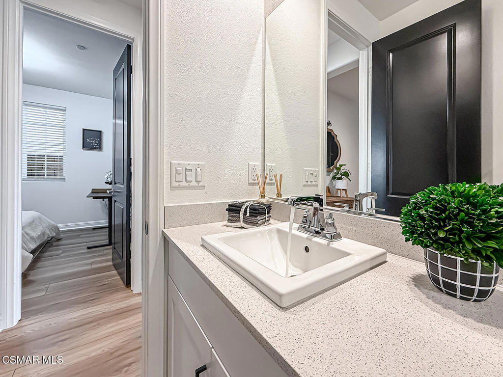 335 Fraser Camarillo, CA 93010 - Photo 32 of 75 a bathroom with a sink and a mirror