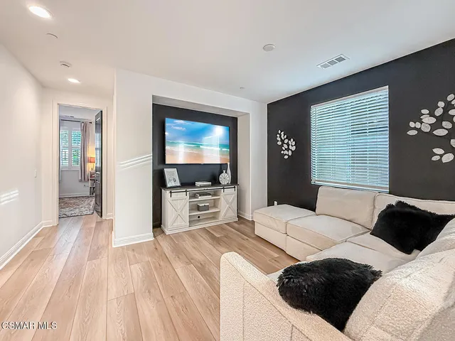 a bathroom with a sink a mirror and a shower