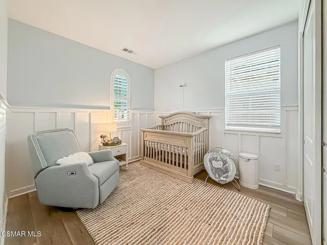 a white bath tub sitting next to a window