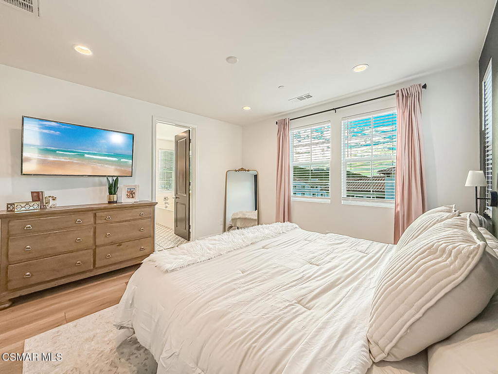 335 Fraser Camarillo, CA 93010 - Photo 56 of 75 a bedroom with a large bed and a window