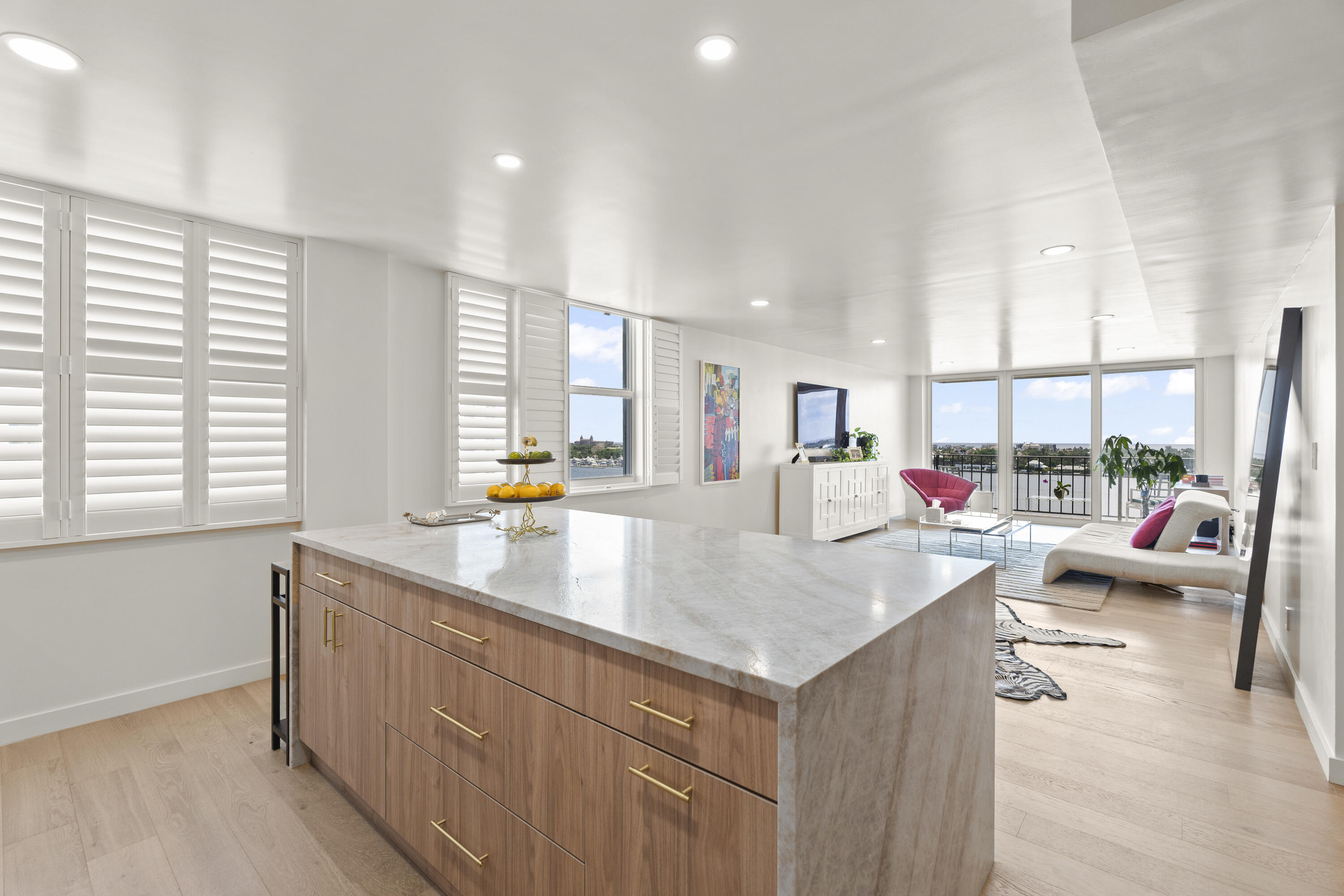 a kitchen with sink refrigerator and window