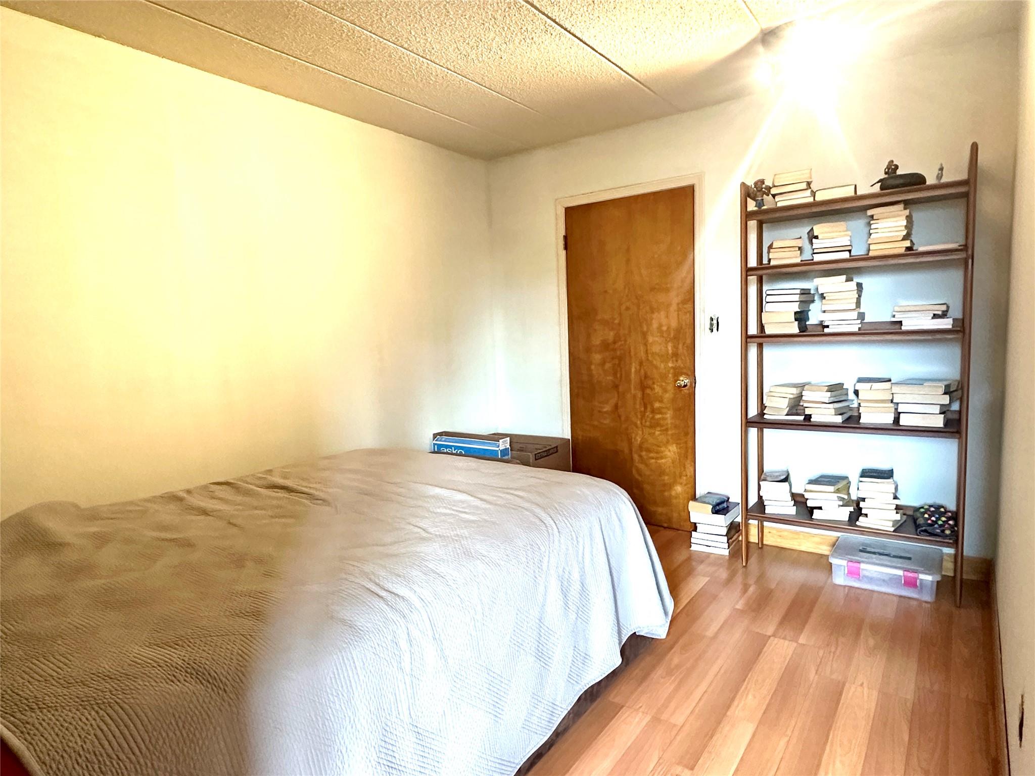 130-14 60th Avenue, Unit 2E Queens, NY 11355 - Photo 6 of 8 Bedroom featuring wood finished floors
