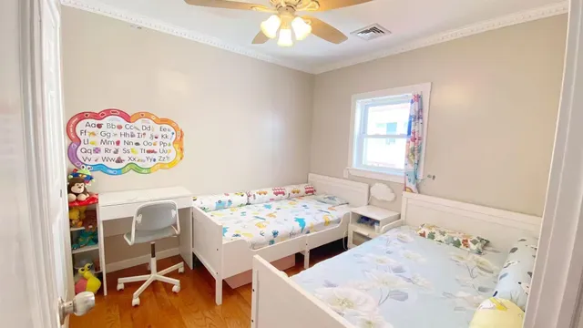 a bedroom with furniture and a table