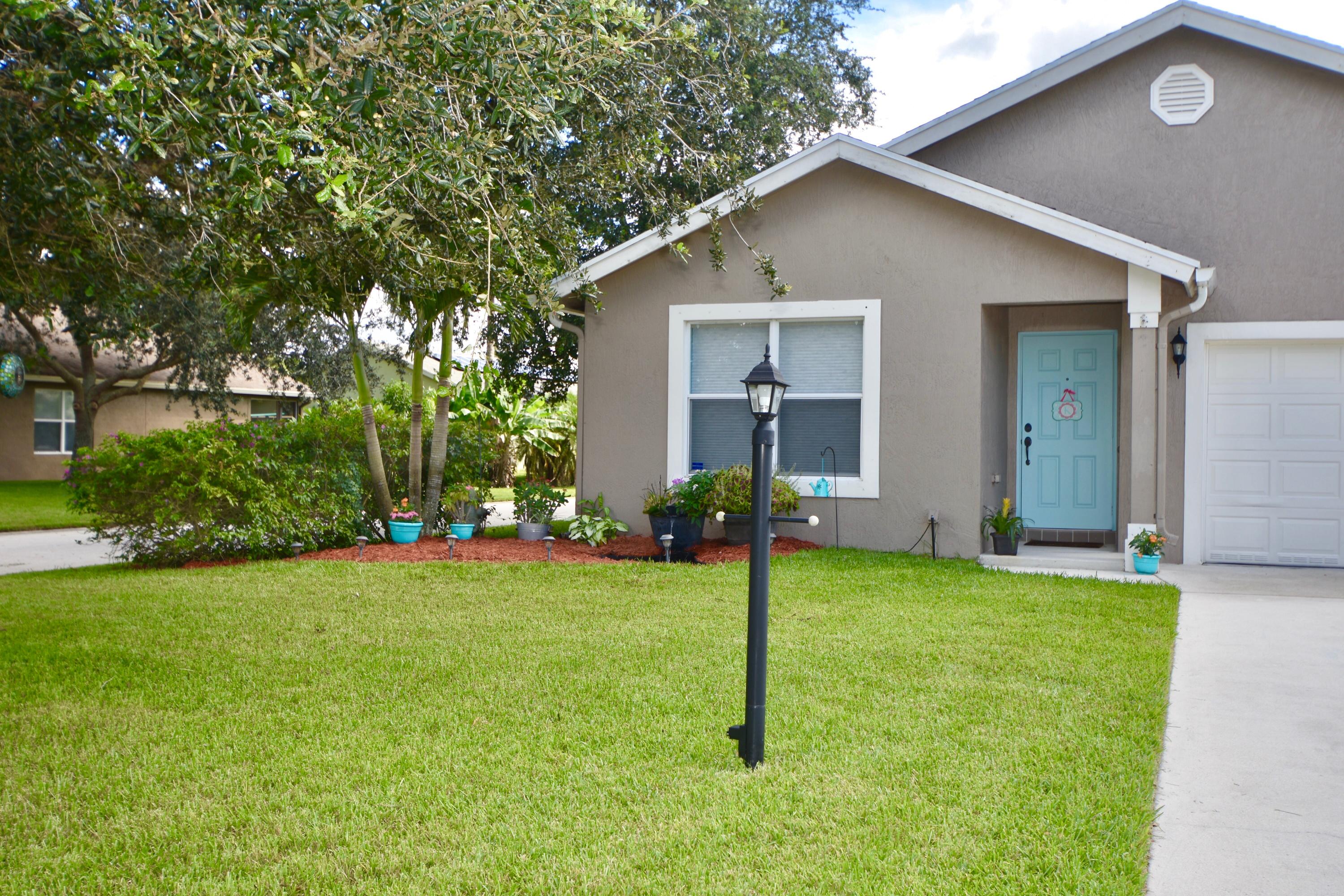 2486 Southwest Impala Way Stuart, FL 34997 - Photo 49 of 66 Front yard